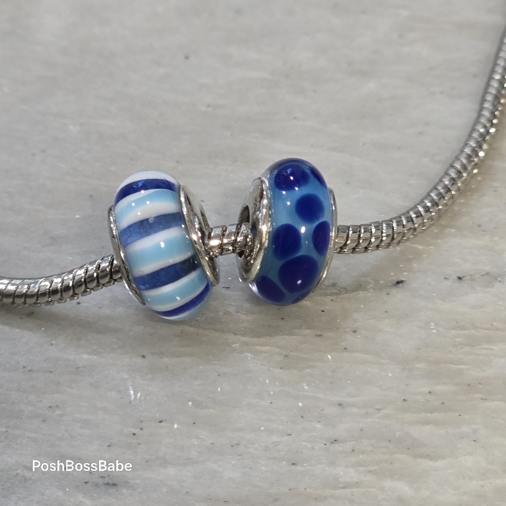 2 murano glass silver center blue beads